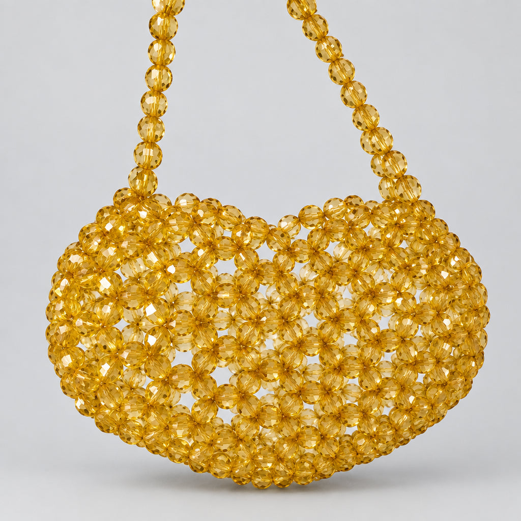 Golden Aura Bag, warm golden amber beads in a rounded shape, front view