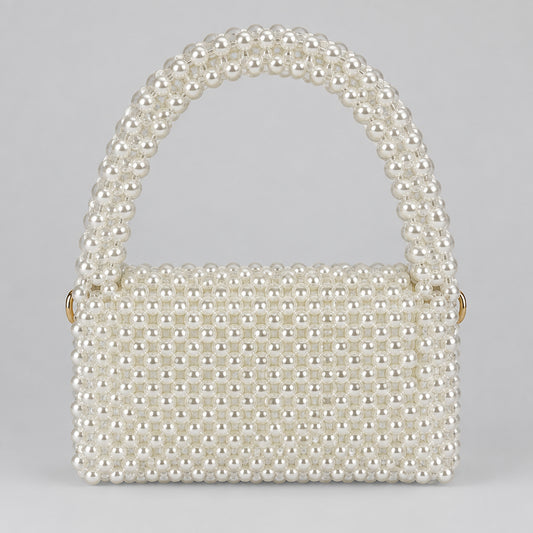 Pearl Muse Bag, structured white pearl bag with a beaded handle, front view