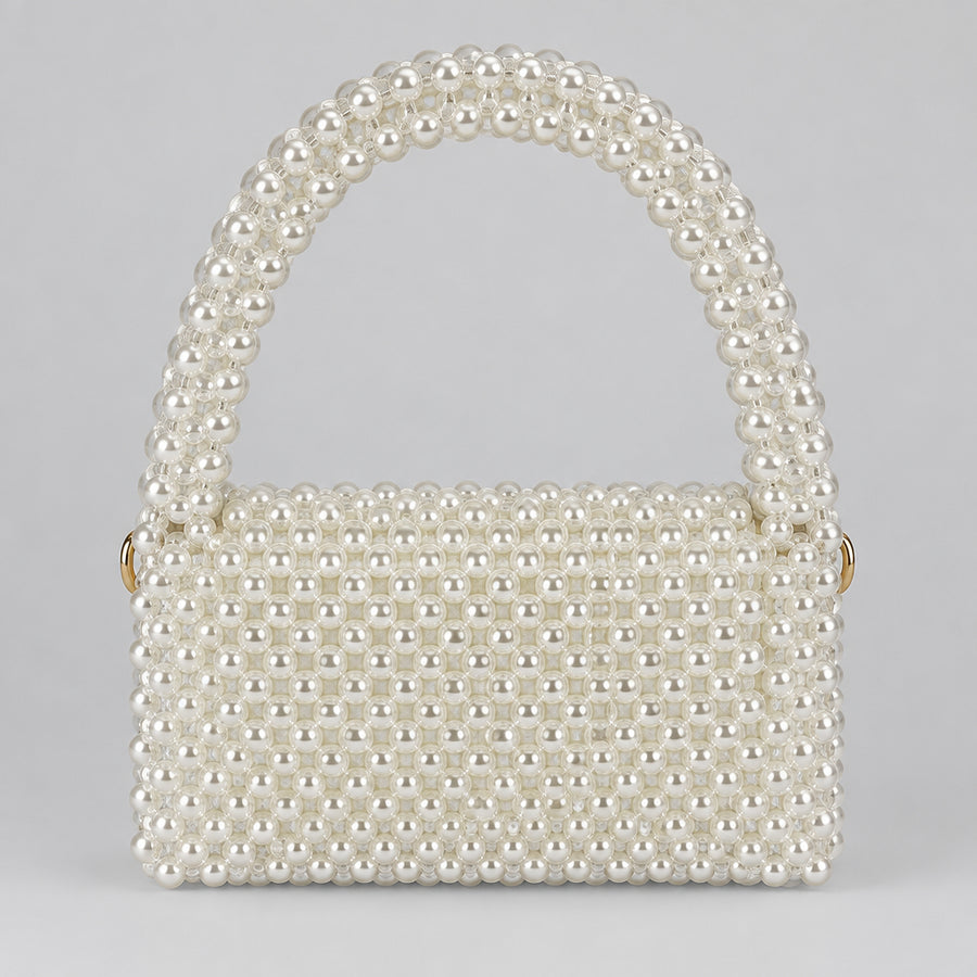 Pearl Muse Bag, structured white pearl bag with a beaded handle, front view